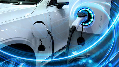 Töltőre helyezett elektromos autó